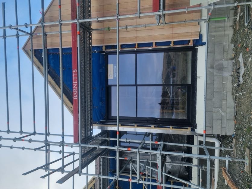 Exterior carpentry and cladding work on a residential project